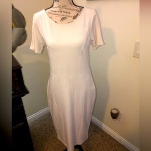 Never-worn, Retro, wiggle dress, midi length in cream white.